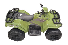 Green toy ATV on a tiled floor with other toys in the background