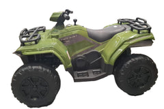 Green toy ATV on display in a store with boxes in the background